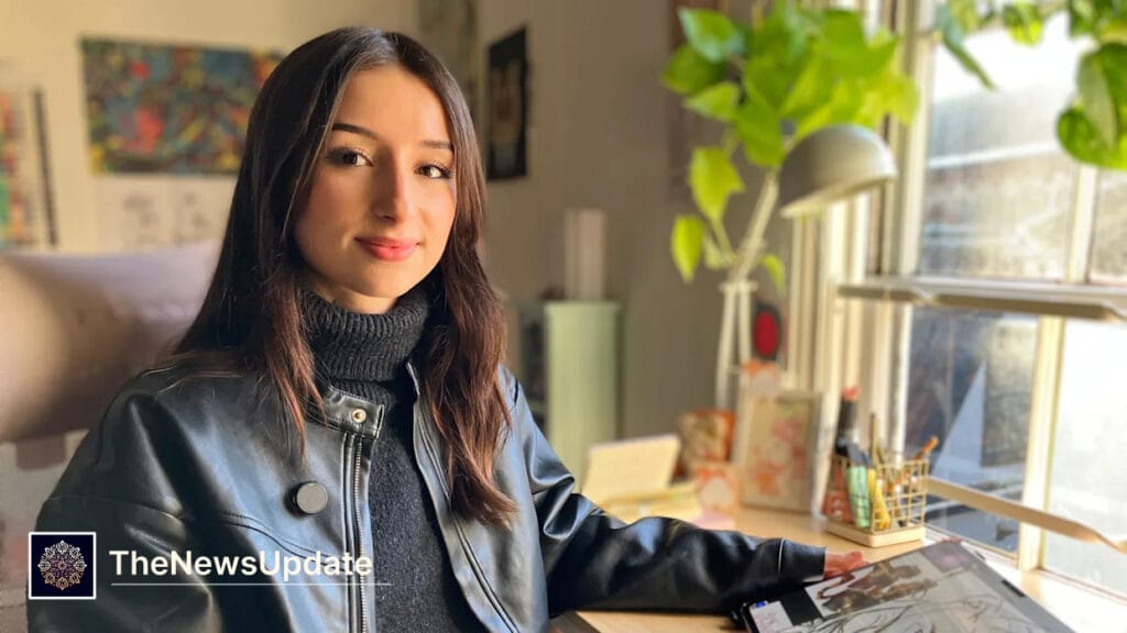 Artist Aisha Belarbi creating digital art on a tablet computer